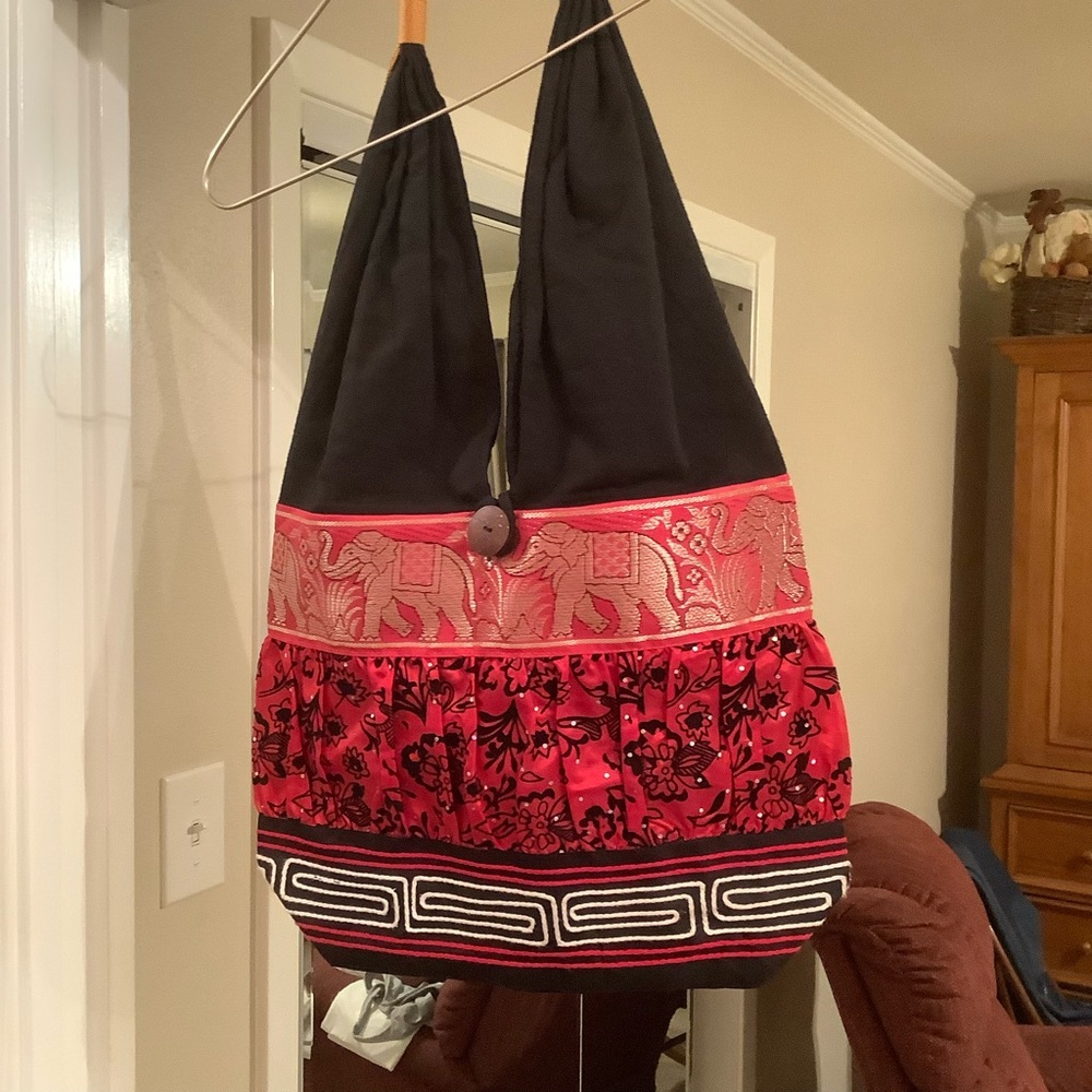 This is a beautiful, lined, Boho tote bag that has never been used.